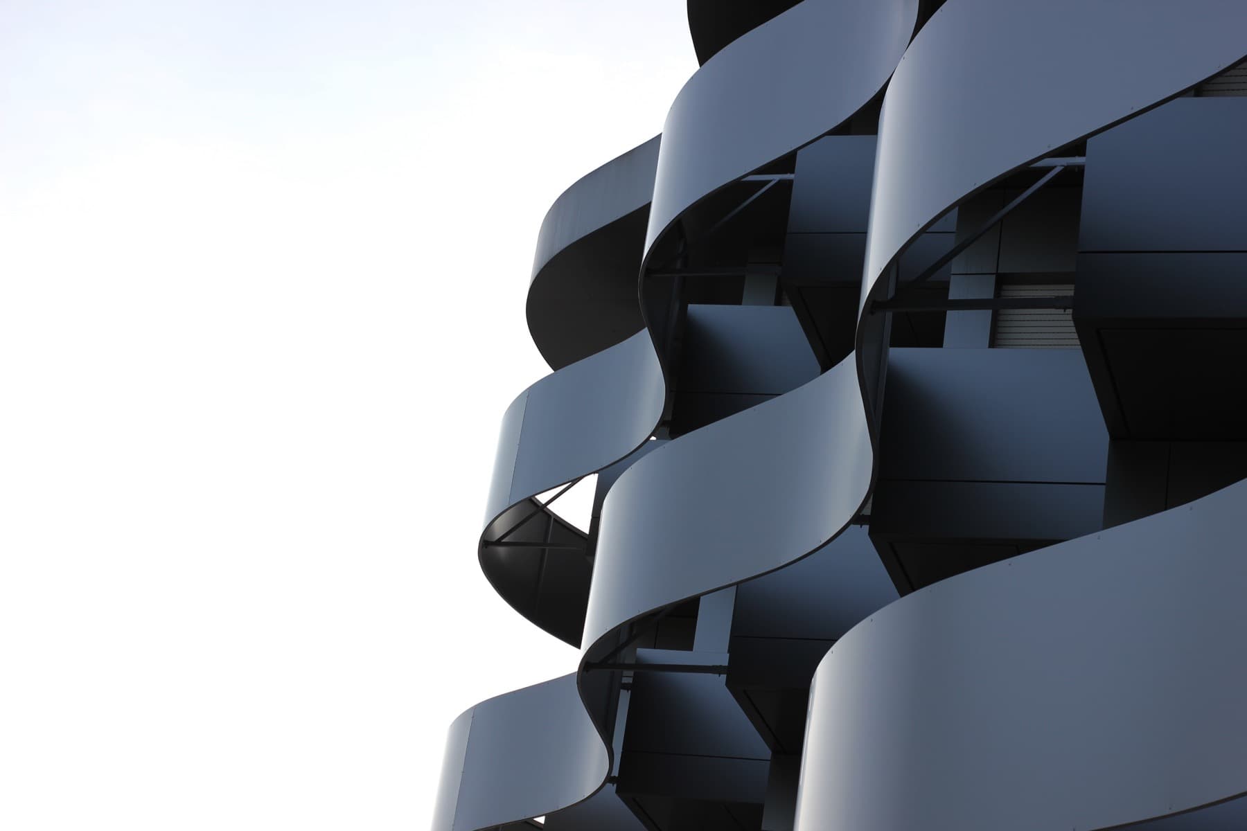 Curved contemporary architecture in black and white