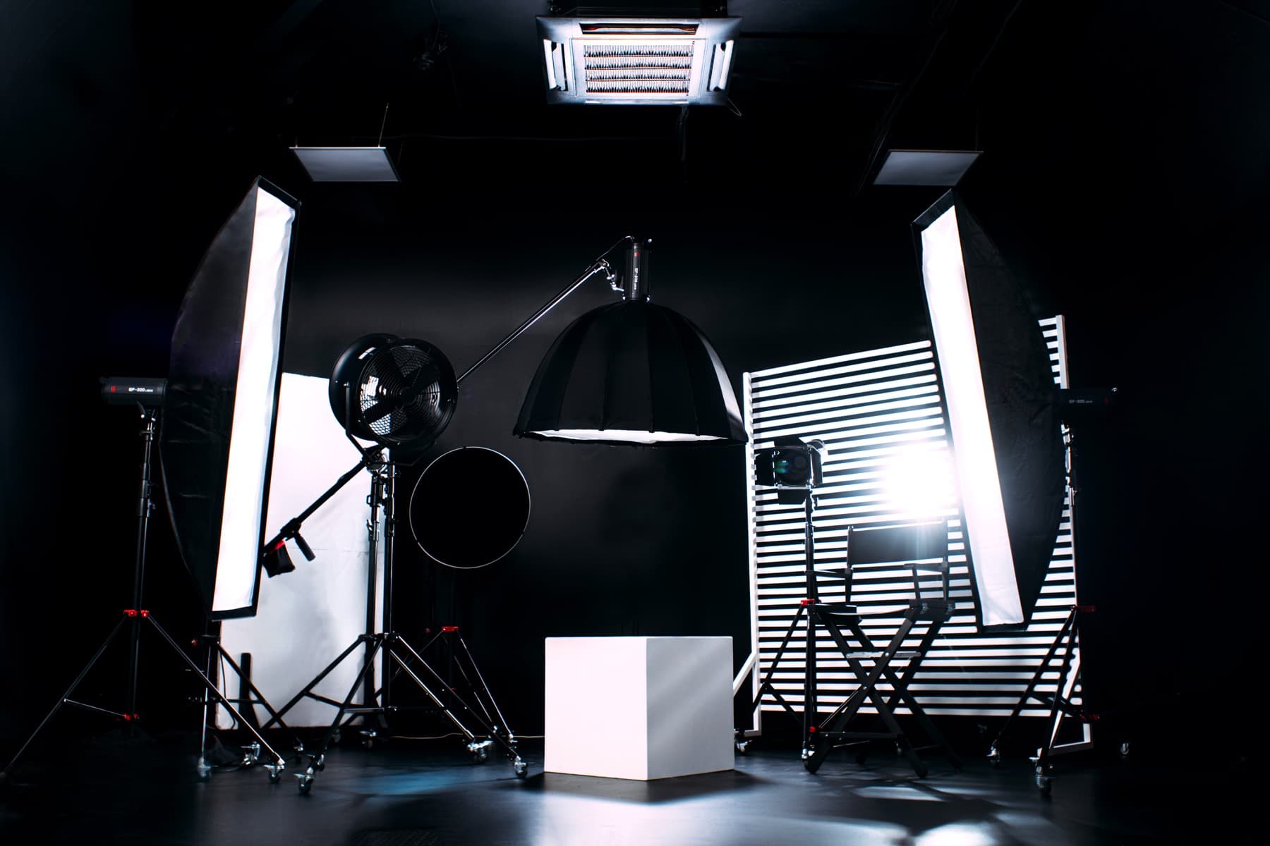 A monochrome production studio prepared for a shoot